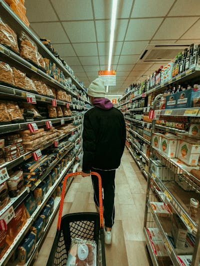 Person shopping alone in a supermarket