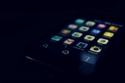 Close up of phone screen with apps