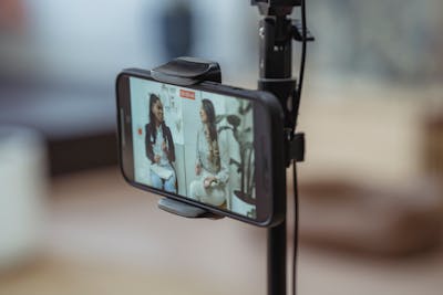 Young woman taking a selfie with a smartphone