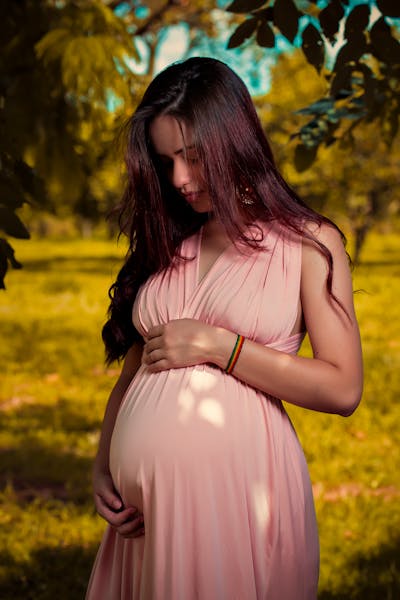 Pregnant woman sitting peacefully
