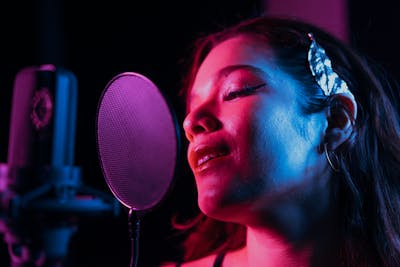 Female performer on stage at a concert