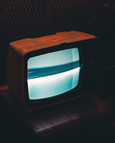 Colourful television set with remote control